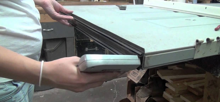 damaged steel door repair Northwest Edmonton
